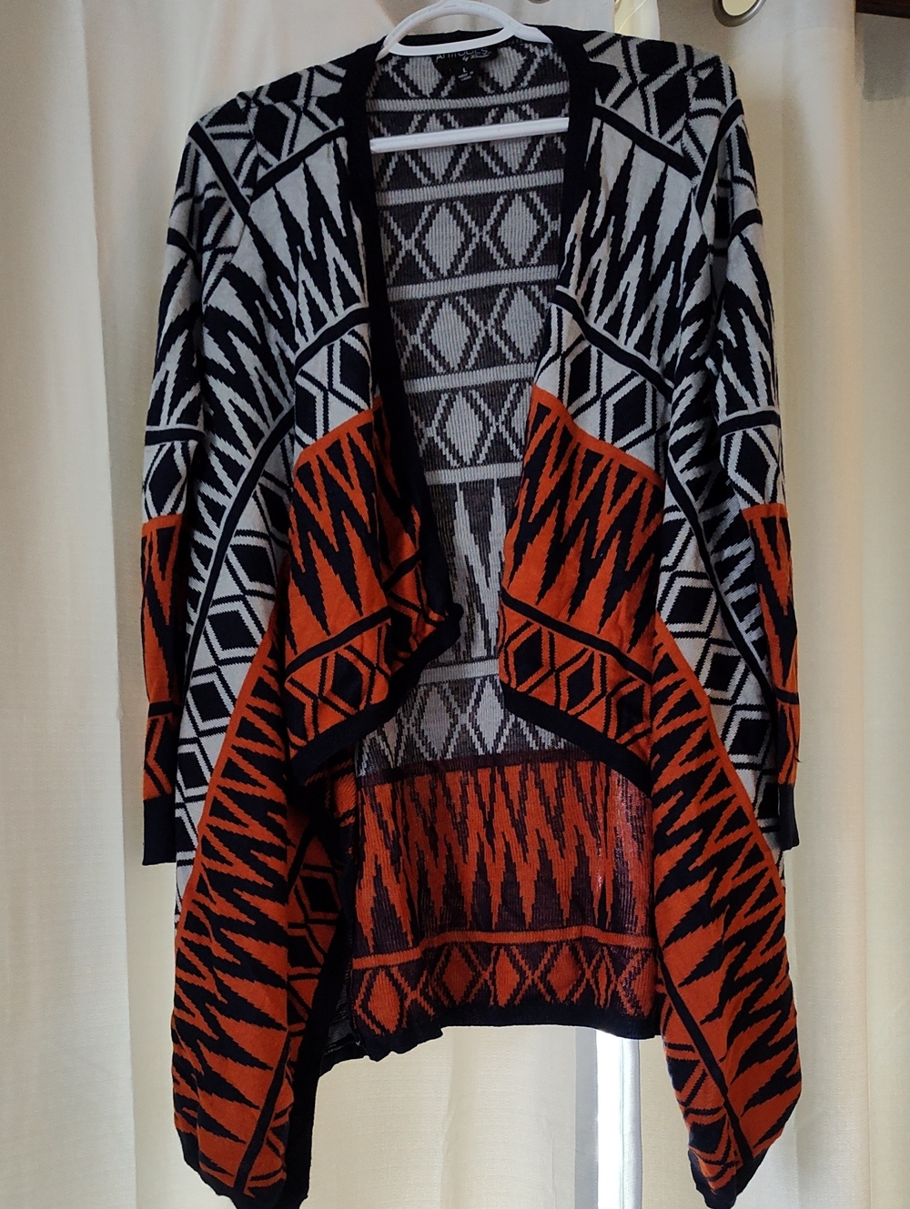 Attitudes by Renee Open-Front Geometric Knit Cardigan in Orange & Black